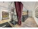 Exquisite hallway with glass displays, elegant railings, and designer details at 127 N Tryon St # 511, Charlotte, NC 28202