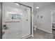 This bathroom has a seamless glass shower with white subway tiles and modern finishes at 130 Cherokee Ln, Salisbury, NC 28147