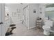 The bathroom includes a double vanity, a glass-enclosed shower, and a toilet with modern fixtures at 130 Cherokee Ln, Salisbury, NC 28147