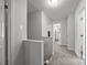 Upstairs hallway with carpet flooring and multiple rooms at 130 Cherokee Ln, Salisbury, NC 28147