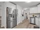 Kitchen with stainless steel appliances, granite countertops, and hardwood flooring at 130 Cherokee Ln, Salisbury, NC 28147