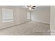 Spacious carpeted bedroom with two windows at 133 Stonewater Dr # 16P, Red Cross, NC 28129