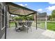 Backyard featuring a deck with dining, fenced yard, and landscaped surroundings at 1358 Colwick Ln, Rock Hill, SC 29732