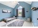 Light blue bedroom featuring a vaulted ceiling with a window, gray rug, and bed at 1358 Colwick Ln, Rock Hill, SC 29732