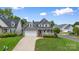 Lovely two-story home with an attached garage and a charming, covered front porch at 1358 Colwick Ln, Rock Hill, SC 29732