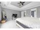 Large main bedroom featuring a tray ceiling, ceiling fan, and a dedicated desk area at 1358 Colwick Ln, Rock Hill, SC 29732