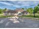 Attractive community clubhouse featuring a welcoming entrance, and nearby amenities at 1607 Tundra Ln, Denver, NC 28037