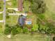 Aerial view of a home with a swimming pool on a lush golf course community at 172 Fairway Cir, Rock Hill, SC 29730