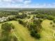 Aerial view of homes in a lush golf course community surrounded by trees at 172 Fairway Cir, Rock Hill, SC 29730