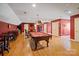 The finished basement boasts a pool table and ample space for entertaining at 172 Fairway Cir, Rock Hill, SC 29730