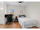 This bedroom features hardwood floors, neutral walls, a ceiling fan, and a window at 172 Fairway Cir, Rock Hill, SC 29730