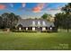 Beautiful brick home nestled on an expansive lawn, showcasing a timeless design and curb appeal at 172 Fairway Cir, Rock Hill, SC 29730