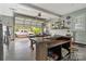 View of the open garage with a custom wood bar, window, and a truck parked outside at 172 Fairway Cir, Rock Hill, SC 29730