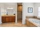 Main bathroom with tub, glass shower, tiled floor, and vanity at 172 Fairway Cir, Rock Hill, SC 29730
