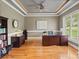 Comfortable home office featuring hardwood floors, large window, and custom wooden desk at 172 Fairway Cir, Rock Hill, SC 29730