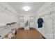 Organized walk-in closet with built-in shelving and hardwood floors at 172 Fairway Cir, Rock Hill, SC 29730