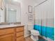 Bathroom featuring vanity with granite countertop and shower with decorative curtain at 176 Jennymarie Rd, Mooresville, NC 28115
