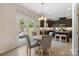 Dining area adjacent to the kitchen and features a door to the backyard at 176 Jennymarie Rd, Mooresville, NC 28115