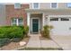 Charming front entrance with a green door, decorative plants, and a well-maintained walkway at 176 Jennymarie Rd, Mooresville, NC 28115