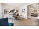 Bright and airy office space with a large desk, built-in shelving, and ample natural light at 176 Jennymarie Rd, Mooresville, NC 28115