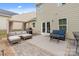 Cozy outdoor patio with stylish seating, a grill, and a serene ambiance, creating an ideal spot for entertainment at 176 Jennymarie Rd, Mooresville, NC 28115