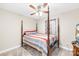 Bedroom with a four-poster bed, ceiling fan and neutral paint at 201 Churchill Dr, Kings Mountain, NC 28086