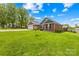 Expansive well-maintained yard that surrounds this beautiful brick home with a detached shed at 201 Churchill Dr, Kings Mountain, NC 28086