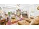 Bright and spacious living room with tray ceilings, hardwood floors and comfortable furnishings at 201 Churchill Dr, Kings Mountain, NC 28086