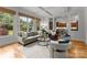 Comfortable living room with hardwood floors, natural light, and stylish furnishings, open to the gourmet kitchen at 2304 Thunder Gulch Ct, Waxhaw, NC 28173