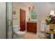 Elegant bathroom featuring tiled floor, modern fixtures, and granite countertops for a luxurious experience at 2306 Beechwood Dr, Waxhaw, NC 28173
