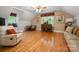 Cozy bonus room features hardwood floors, natural light, window seat and seating area at 2306 Beechwood Dr, Waxhaw, NC 28173