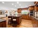Charming kitchen with granite counters, stainless steel appliances, and an eat-in breakfast nook at 2306 Beechwood Dr, Waxhaw, NC 28173