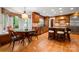 Bright eat-in kitchen features granite counters, hardwood floors, and a cozy breakfast nook at 2306 Beechwood Dr, Waxhaw, NC 28173