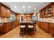 Gourmet kitchen featuring a large island, stainless appliances, and custom cabinetry at 2306 Beechwood Dr, Waxhaw, NC 28173