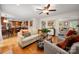 Bright living room with hardwood floors and an open layout perfect for entertaining guests at 2306 Beechwood Dr, Waxhaw, NC 28173