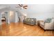 Spacious living room featuring hardwood floors and neutral décor, creating a welcoming atmosphere at 2306 Beechwood Dr, Waxhaw, NC 28173