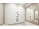 Modern home elevator featuring a control panel and mirrored wall at 2541 Kenmore Ave, Charlotte, NC 28204