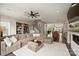 Inviting living room with cozy furniture, hardwood floors, a ceiling fan, and a seamless connection to the dining area at 2541 Kenmore Ave, Charlotte, NC 28204