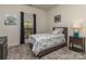 Bedroom featuring a twin bed, grey carpet, and neutral walls with natural light at 2603 Willis Dr, Harrisburg, NC 28075