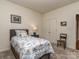 Bedroom featuring a twin bed, grey carpet, and neutral walls with natural light at 2603 Willis Dr, Harrisburg, NC 28075