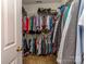 Walk-in closet featuring ample hanging space, shelving, and organized storage for clothing and accessories at 2603 Willis Dr, Harrisburg, NC 28075