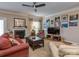 Inviting living room with comfortable seating, a fireplace, and lots of natural light at 2603 Willis Dr, Harrisburg, NC 28075