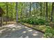 View of patio area with view of treelined backyard at 2710 Red Bud Ln, Fort Mill, SC 29715