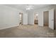Bright bedroom featuring an ensuite bathroom and walk-in closet for ample storage at 2710 Red Bud Ln, Fort Mill, SC 29715