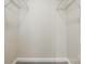 Walk-in closet featuring shelving, offering ample storage space at 2710 Red Bud Ln, Fort Mill, SC 29715