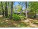 Back exterior of property with trees at 2710 Red Bud Ln, Fort Mill, SC 29715