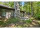 Side exterior with stone chimney and small patio at 2710 Red Bud Ln, Fort Mill, SC 29715