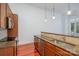 Well-designed kitchen with granite counters, a breakfast bar, and stainless steel appliances at 2810 Selwyn Ave # 410, Charlotte, NC 28209