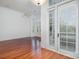 Bright living room enhanced by natural light and hardwood floors, leading to a charming outdoor space at 2810 Selwyn Ave # 410, Charlotte, NC 28209