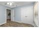 Spacious bedroom with double closets and wood-look flooring at 3004 Point Clear Dr, Tega Cay, SC 29708